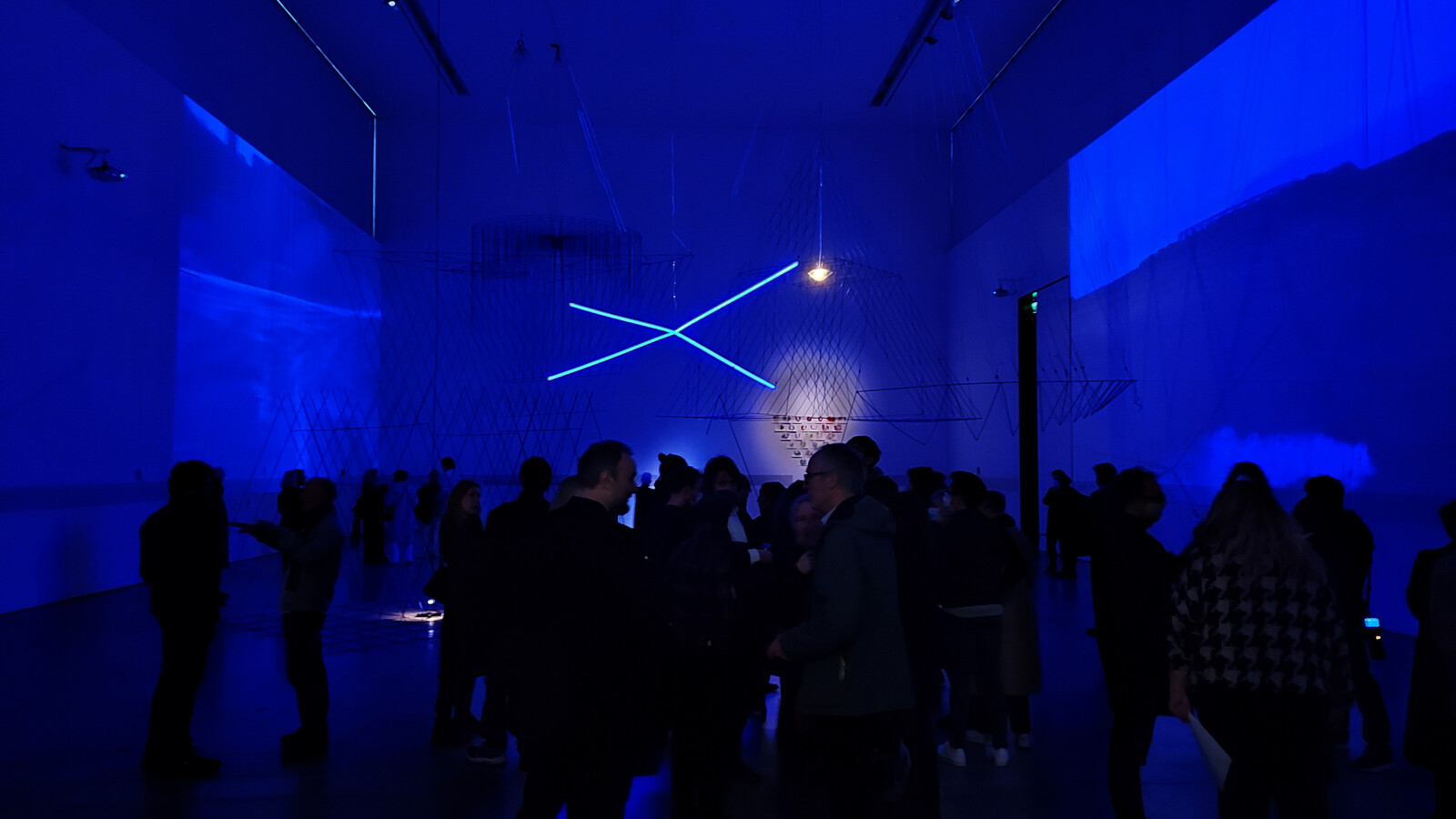 <p>People assemble for the opening of the exhibition, 26 February: Tom dePaor: <em>I See Earth: Building and Ground</em>, VISUAL, Carlow, 2022 (Photograph: Maybury, P.).</p>